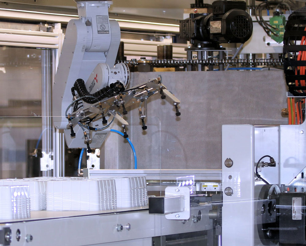 Bild som visar 6-axlig robot i produktio på Thermo Packing System AB